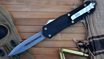 Выкидной фронтальный нож Microtech